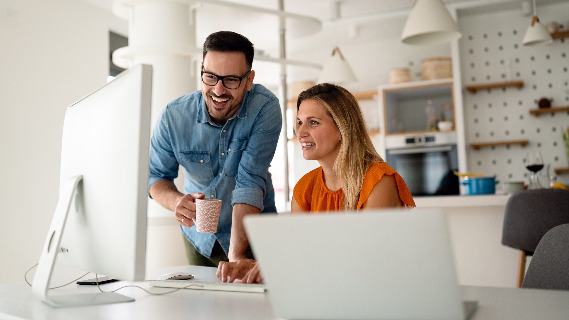 211963017_presentation-wide_normal_none Portrait of success business people working together in home office. Couple teamwork startup concept